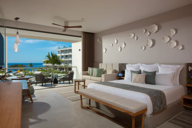 Junior Suite Ocean Front with king bed and balcony access at Dreams Bahia Mita Surf & Spa Resort.