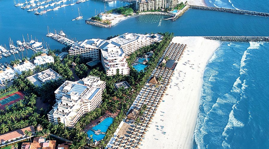 Paradise Village Beach Resort and Spa beachfront family resort with pools and marina access in Nuevo Vallarta, Mexico.
