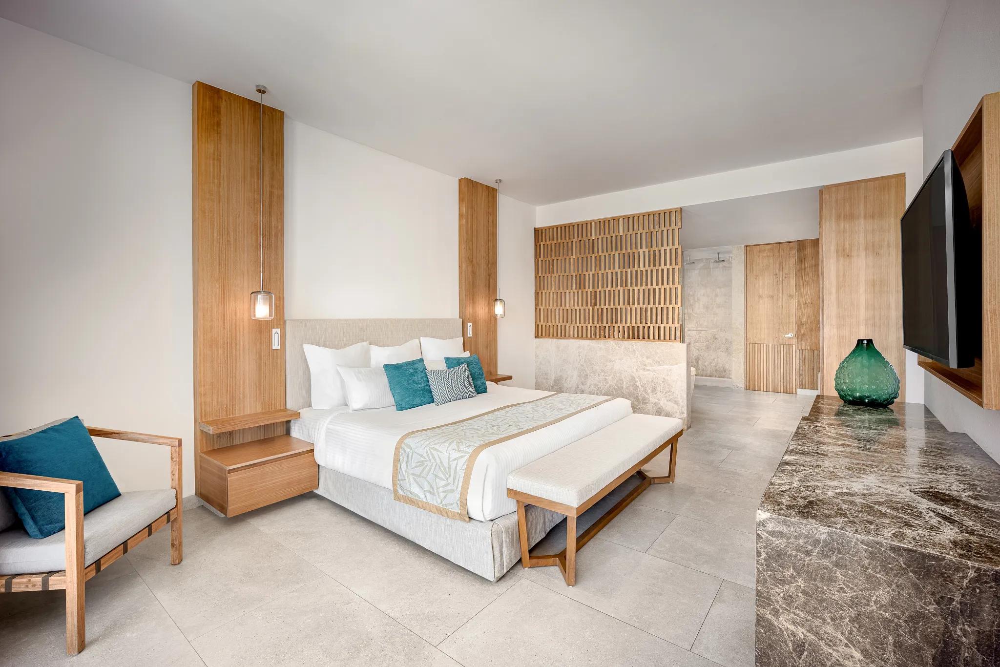 Preferred Club Master Suite Tropical View Swim Out king bedroom at Dreams Bahia Mita Resort.