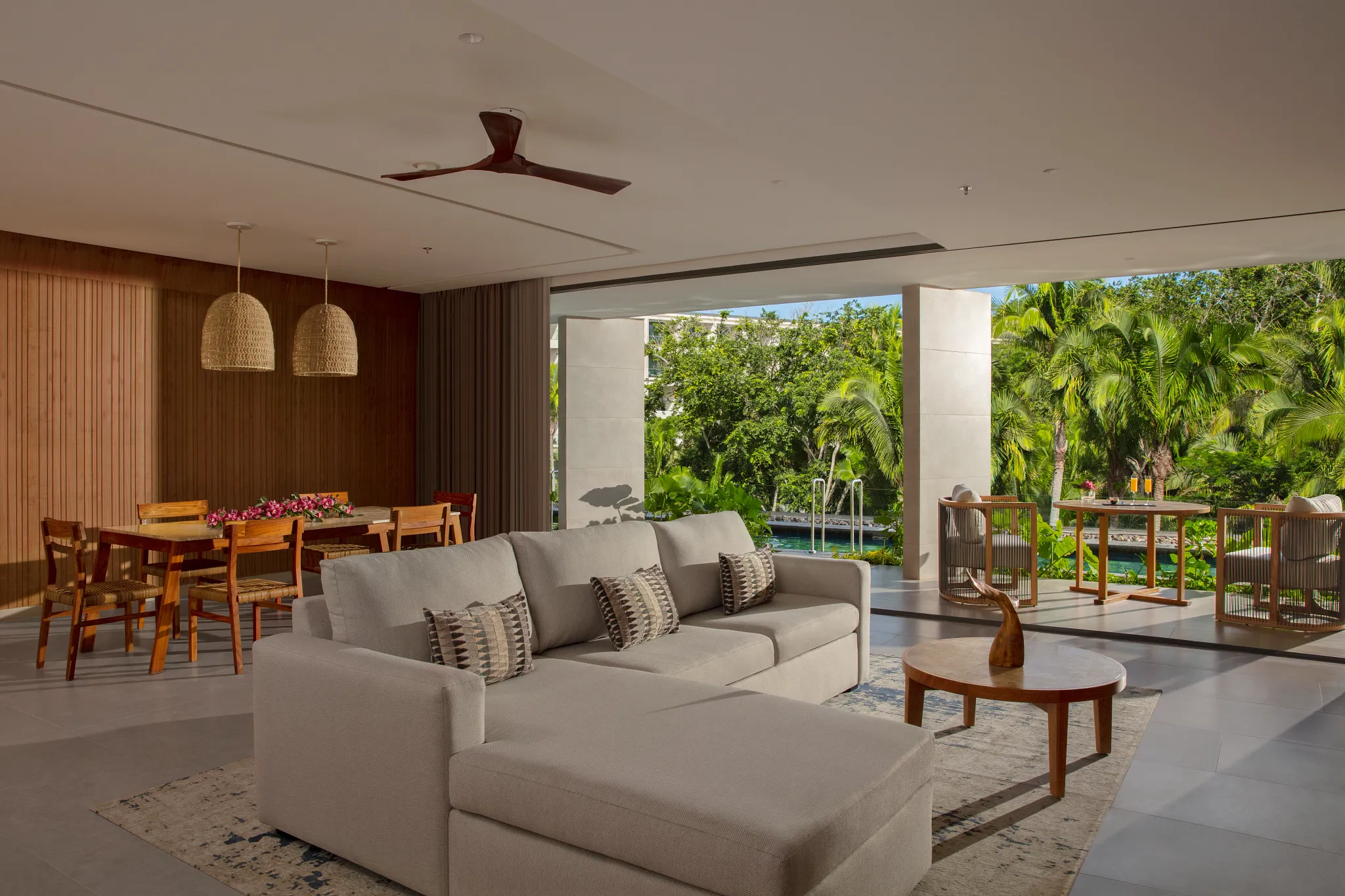 Preferred Club Master Suite Tropical View Swim Out living area with terrace access at Dreams Bahia Mita.