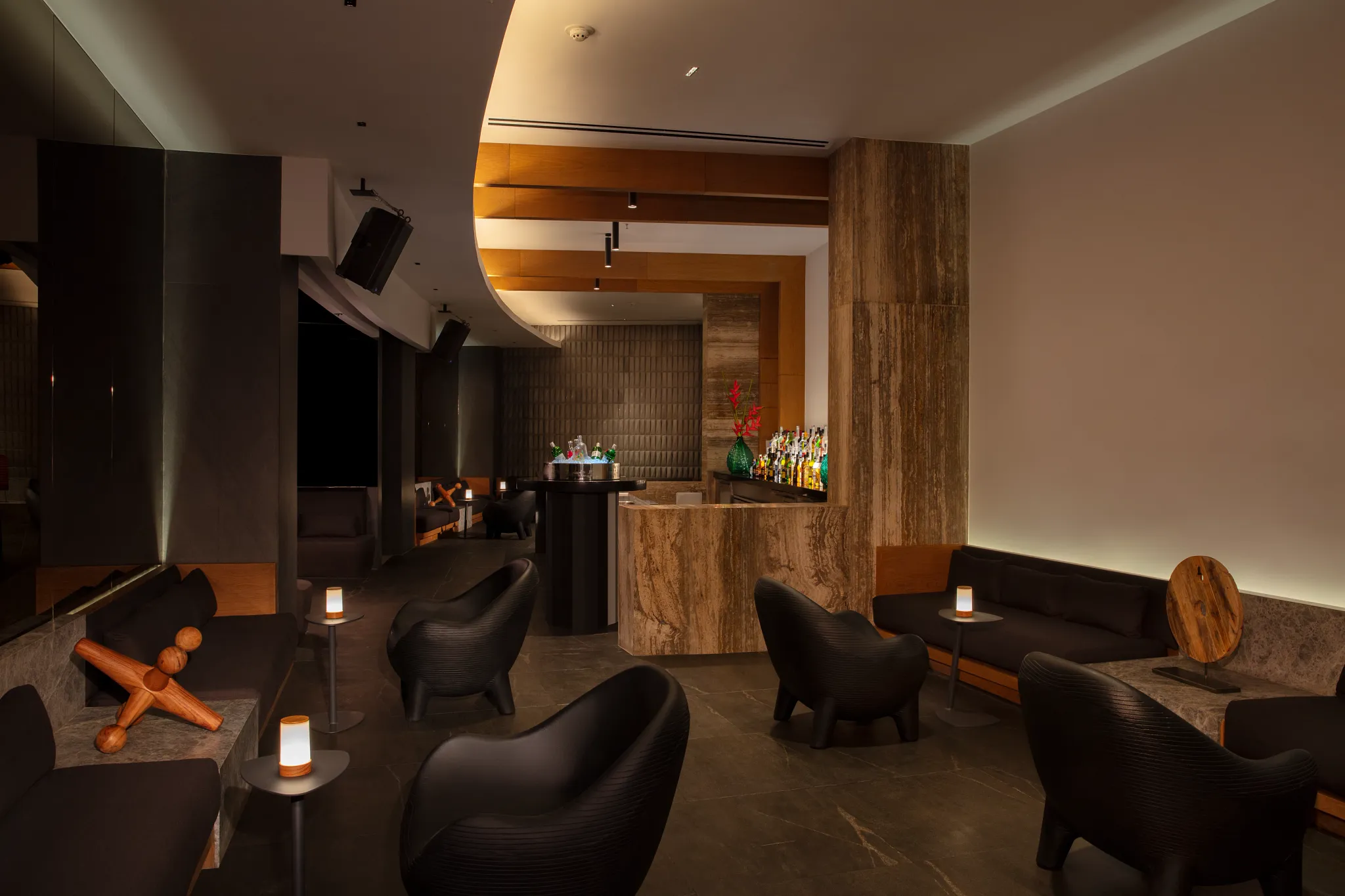 Speak Easy bar at Dreams Bahia Mita Surf & Spa Resort featuring a stylish hidden lounge, craft cocktails, and an intimate nightlife atmosphere.