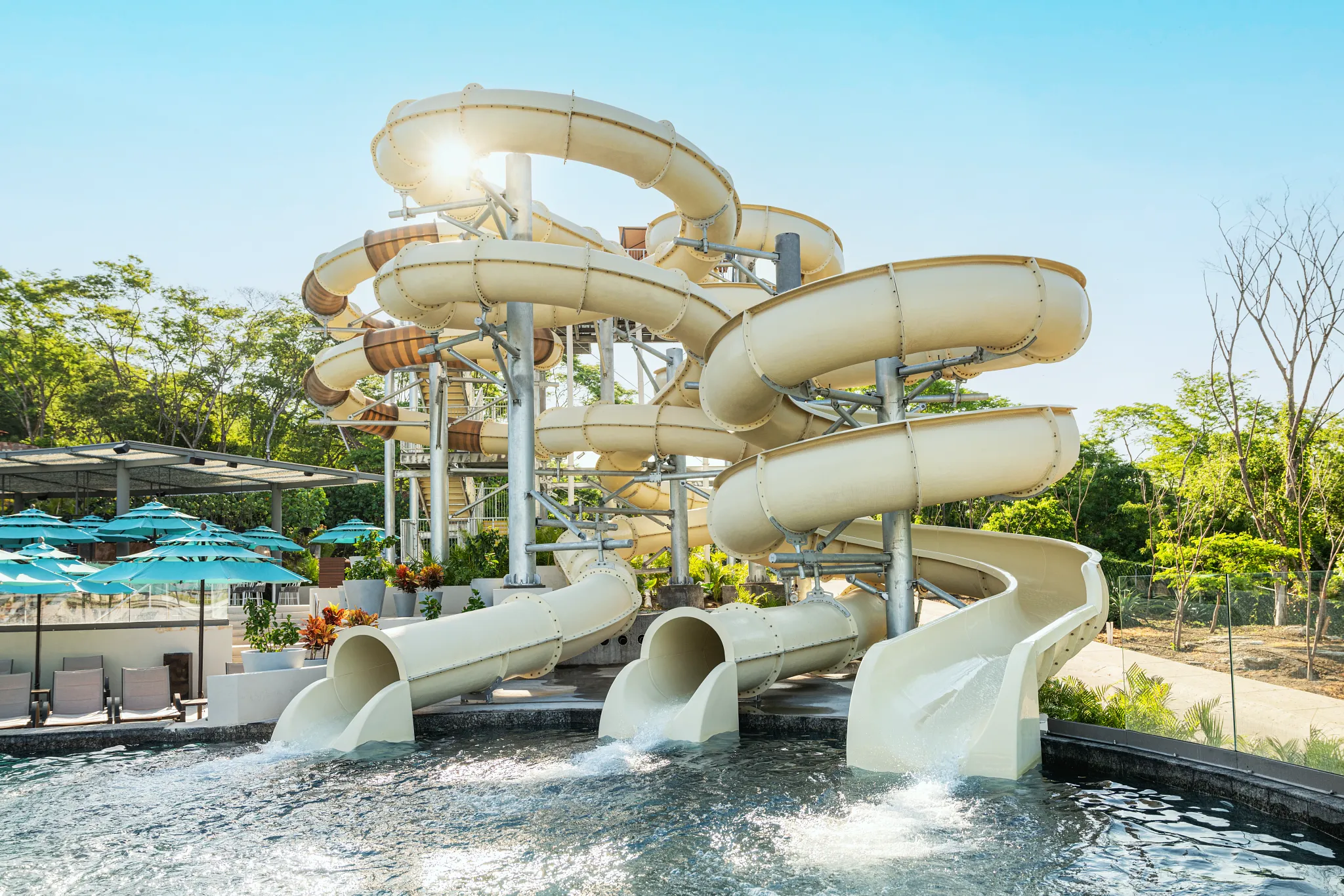 Large twisting water slides at the Dreams Bahia Mita resort water park.